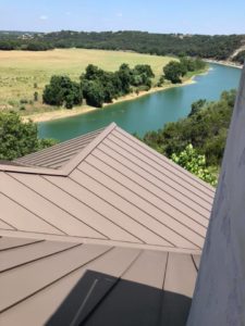 Beautiful new standing seam metal roof overlooking the lake